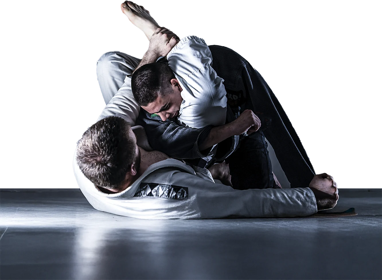 Dois atletas de jiu-jitsu disputando posição no tatame